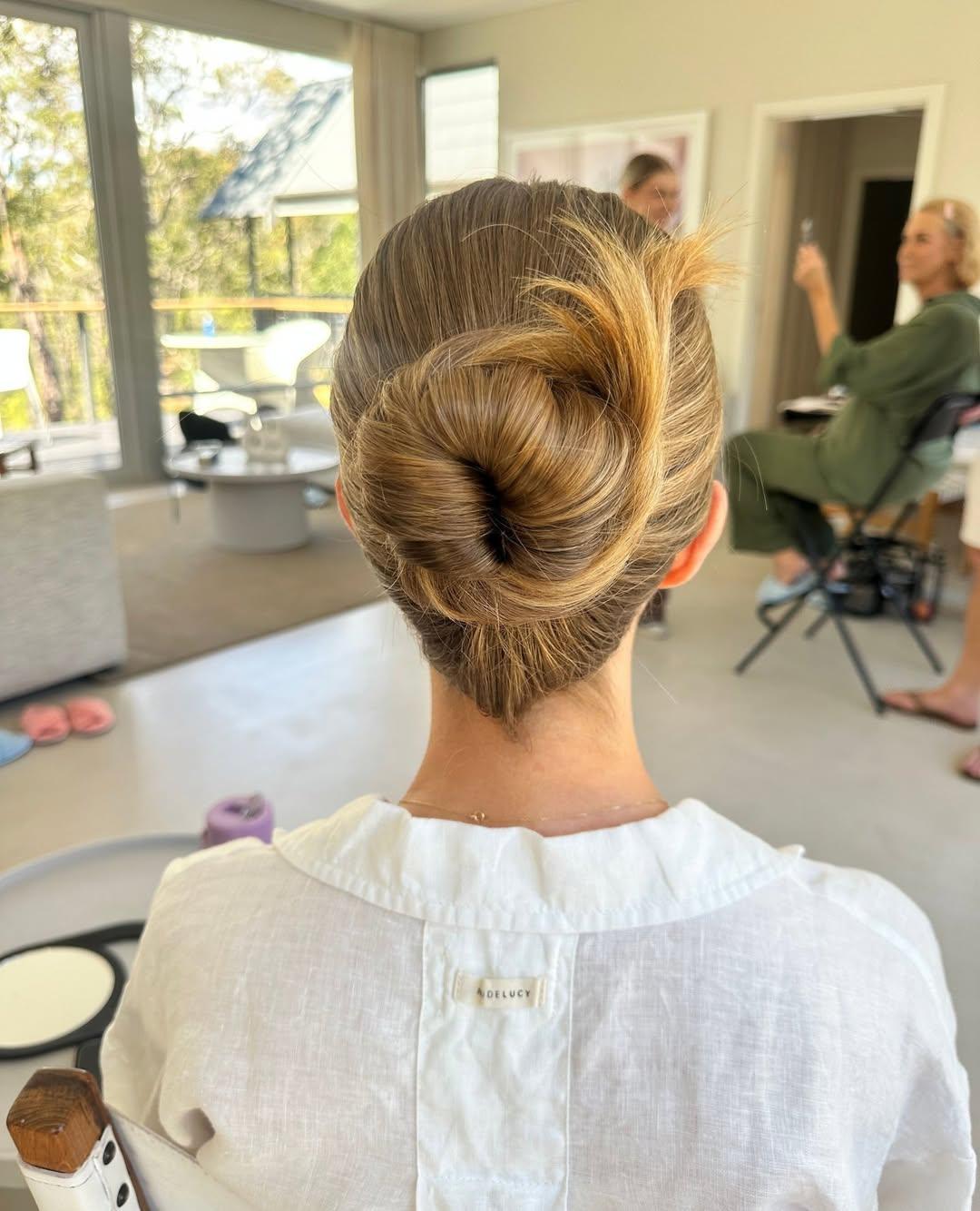 Elegant bridal bun, smooth and low set