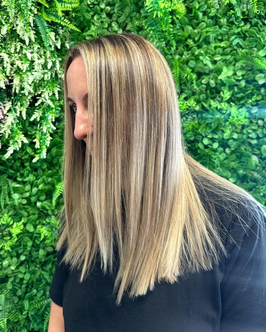 Blonde balayage with dimensional colour through the lengths